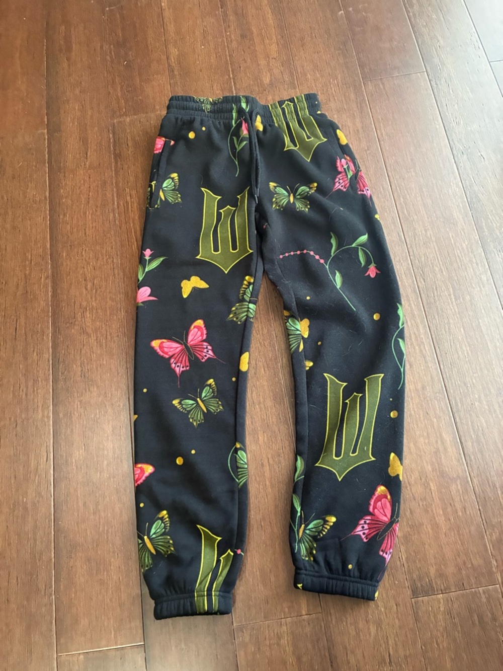 “Wicked” Black Butterfly Print Jogger Pants